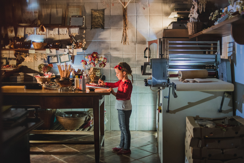 A fairytale image of a young designer from gingerbread.