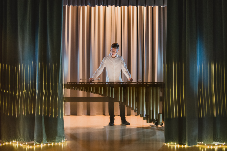 Creative photography of a musician while playing percussion.